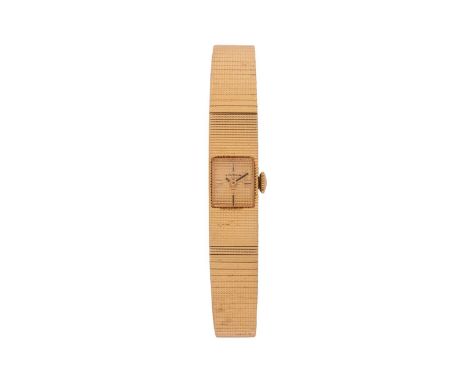 Juvenia An ‘18K’ Wrist Watch Reference: 727680Bezel: Squared, TexturedYear: circa 1965Case Material: ‘18K’ Yellow GoldCase Di