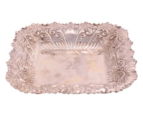 A Victorian square silver dish with embossed scrollwork, by Fenton Brothers, Sheffield 1895, the wide inverted rim with repou