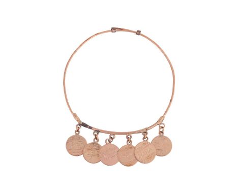 An expandable wire bangle with six suspended disc charms, in yellow metal surface tested as 9ct gold, the charms each engrave