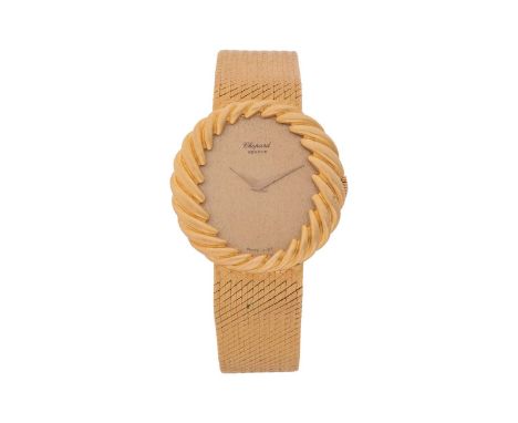 Chopard An ‘18K’ Wristwatch Reference: 4014.1Serial: 55763Bezel: TwistedYear: circa 1980Case Material: ‘18K’ Yellow gold, wit