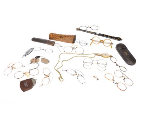 A Collection of Spectacles, including eight pince-nez of different designs, three pairs of spectacles with steel and nickel s