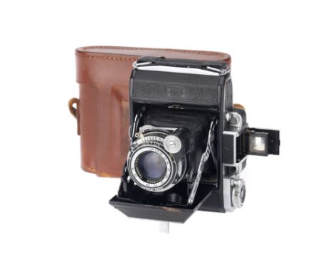 A Zeiss Ikon Super Ikonta Medium Format Rangefinder Camera, chrome, body G, shutter working, RF patch bright &amp; clear, foc