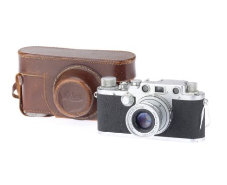 A Leitz Wetzlar Leica IIIc Rangefinder Camera chrome, 1949, serial no.475942, with a Leitz Wetzlar Elmar f/2.8 5cm collapsibl