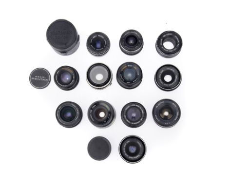 A Mixed Selection of Camera Lenses, to include an MC Helios-44M-6 f/2 58mm lens, optics F-G, cleaning marks &amp; haze presen