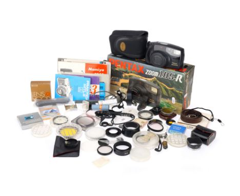 A Pentax Zoom 105-R 35mm Compact Camera, untested, in makers box, together with a range of camera accessories &amp; user manu