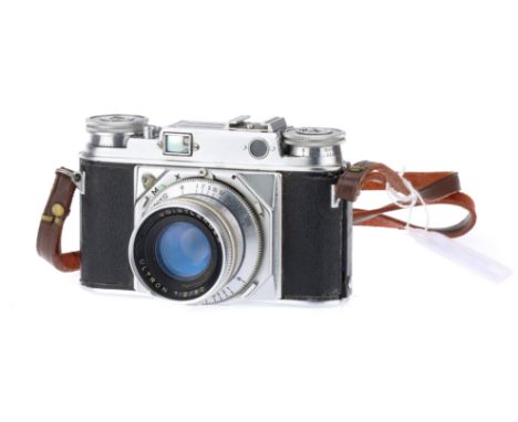 A Voigtlander Prominent Rangefinder Camera, chrome, serial no. B50982, with Voigtlander Ultron f/2 50mm lens, body, G, shutte