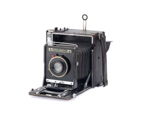 A Folmer-Graflex Anniversary Speed Graphic 5 x 4 Press Camera black, 1940-47, with a Carl Zeiss Jena Tessar f/4.5 13.5cm lens