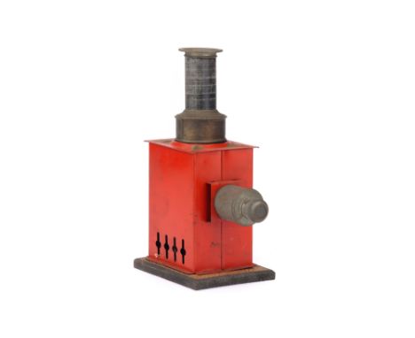 German Tin Plate Lantern, German, c.1900, unsigned with red painted tin plate body on wooden base with parts of original oil 