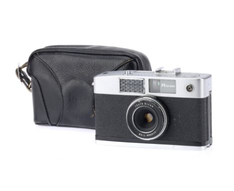 A Ricoh Caddy 35mm Half Frame Viewfinder Camera, chrome, body G-VG, shutter working, speeds not tested for accuracy, with f/2