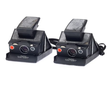 Two Polaroid SX-70 Land Camera Alpha Model 1 Instant Cameras, both black, bodies F-G, leatherette has significant deteriorati