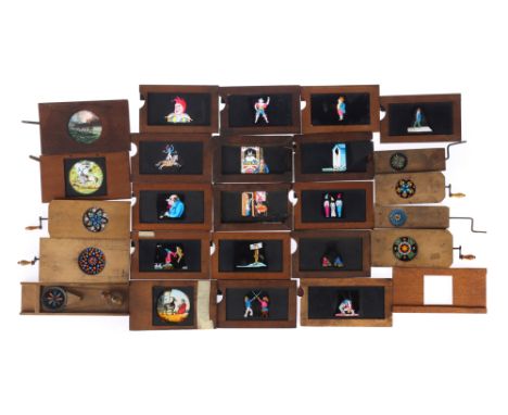 Collection of 24 Mahogany Framed Magic Lantern Slides, comprising of 6 European chromatrop-type slides, two rocking slides wi