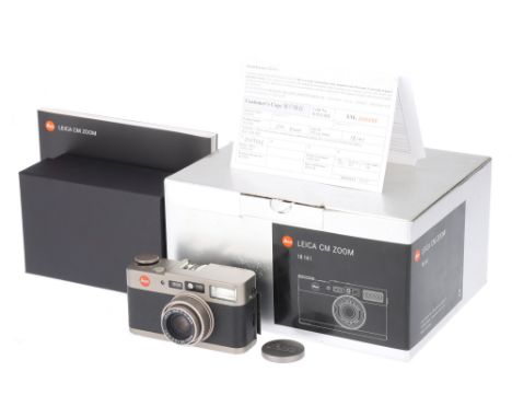 A Leica CM Zoom Compact Camera, 2004, champagne, serial no. 2969356, with Leitz Vario-Elmar f/3.5-6.5 35-70m lens, body, VG-E