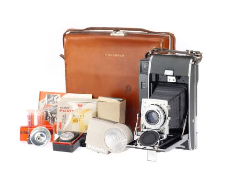 A Polaroid Land Camera 110A Camera Outift, in maker's carry case with accessories, camera P-F, corrosion,
