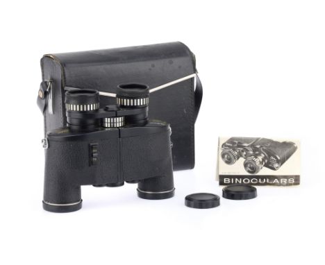 A Pair of Tasco Executive Electric 7-15 x 35 Binoculars, black, body G, zoom function working at time of auction, optics G-VG