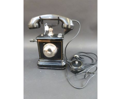 An early/ mid 20thC Danish telephone with crank handle, together with a vintage style telephone 