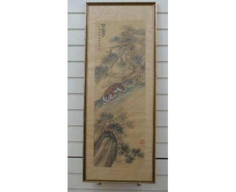 A Chinese silk scroll painting of a crouching tiger circa 1920s/30s, 89x30cm