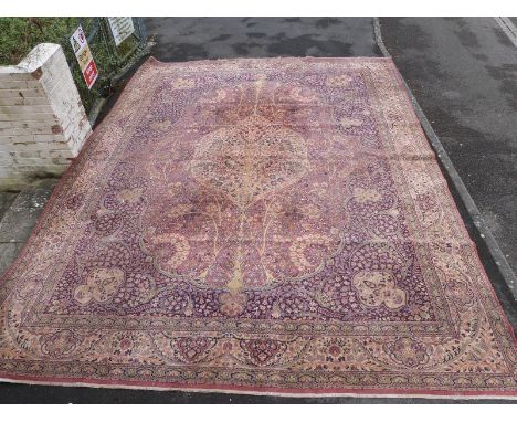 A very large Persian style carpet. 