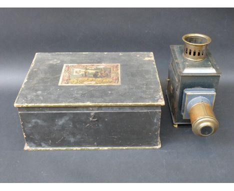 A Ernest Plank magic lantern in original fitted box with a collection of slides