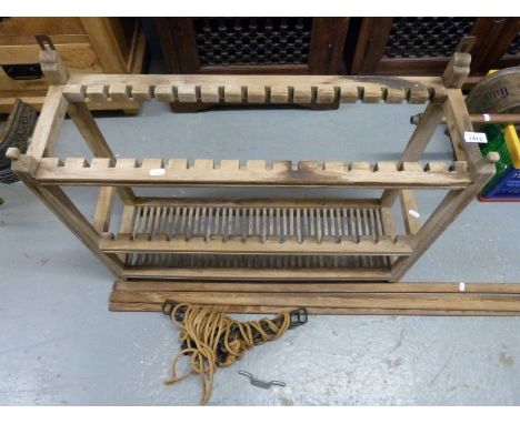 A vintage pine plate rack and a pine and cast iron clothes airer suitable for above a Rayburn or range