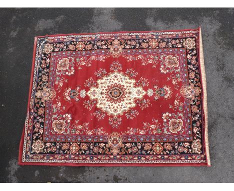 A Persian style carpet. 