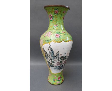 Chinese enamel vase decorated with birds and flowers on a green ground, 34cm tall, together with a cloisonne planter raised o