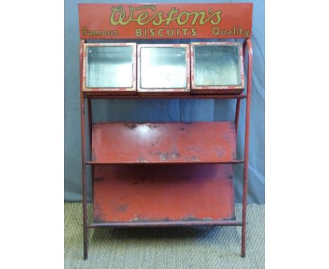 A vintage Weston's biscuits shop display stand with three hinged glass topped containers (W78 x D42 x H115cm) 
