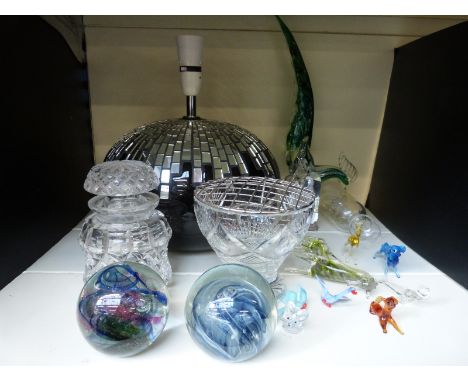 A small collection of glass items to include "art bird" paperweights, flower frog, Swarovski mouse and a mirror tile table la