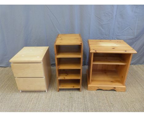 A pine shelf unit, further similar unit and a two drawer birch chest of drawers 