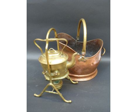 A copper coal scuttle, brass spirit kettle and a fireguard