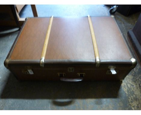 A vintage ash bound suitcase