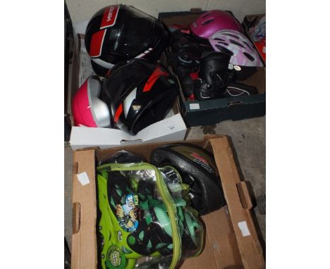 THREE TRAYS OF ROLLER SKATES & HELMETS PLUS TWO MOTORING HELMETS