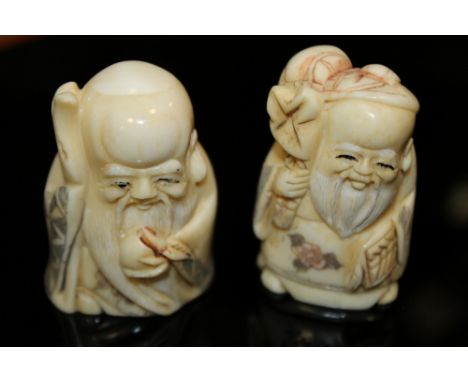 TWO BONE NETSUKE STYLE FIGURES