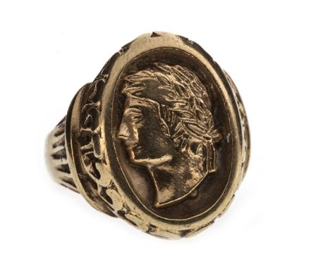 ROMAN STYLE RING, the bezel of oval form and with the image of a Roman gentleman facing left, moulded border, marked 9CT, siz