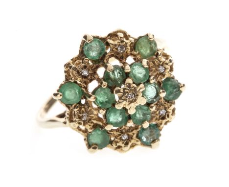 NINE CARAT GOLD GREEN GEM AND DIAMOND RING, the pierced bezel 16.9mm wide and with a central daisy cluster of green gems with