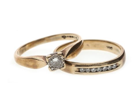 DIAMOND SOLITAIRE RING, with an illusion set diamond of approximately 0.11 carats, in nine carat gold, size N 1/2, 1.1g; alon