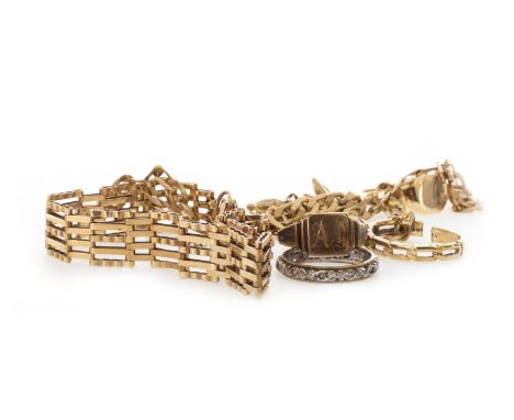 FOUR NINE CARAT GOLD RINGS, along with an unmarked ring, two nine carat gold bracelets and a nine carat gold chain, 26g gross