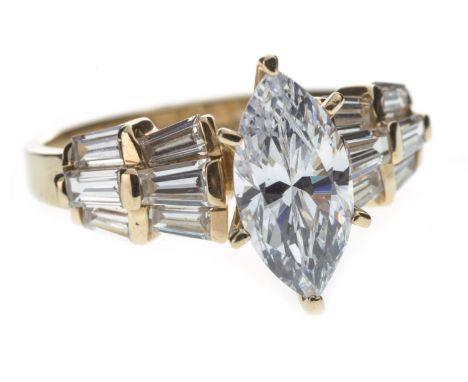 GEM SET RING, with a high set marquise shaped white gem 12mm long, on channel set gem set shoulders, marked 14K, size N, 4g
