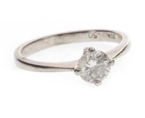 DIAMOND SOLITAIRE RING, set with a single four claw mounted round brilliant cut diamond, marked 950, size I 1/2, 2.8g