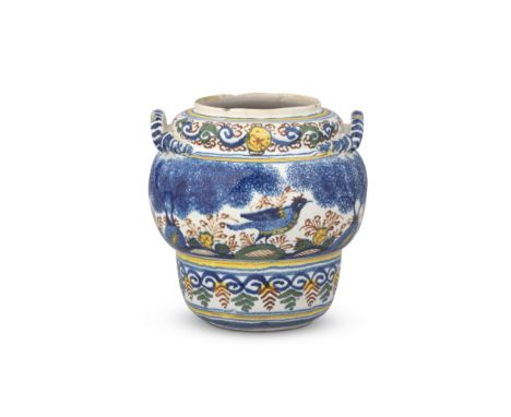 An English delftware spice jar, circa 1700-20Bristol or London, of acorn shape, the loop handles with coiled terminals, paint