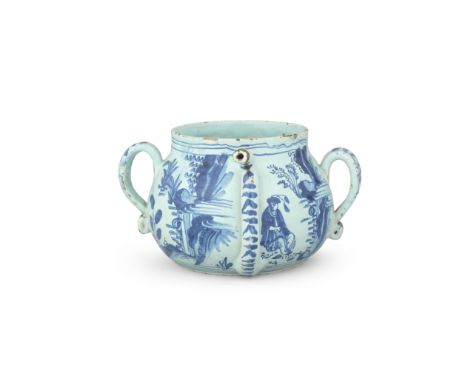 An English delftware posset pot, circa 1690Probably Brislington, of bellied form, the strap handles with rolled lower termina