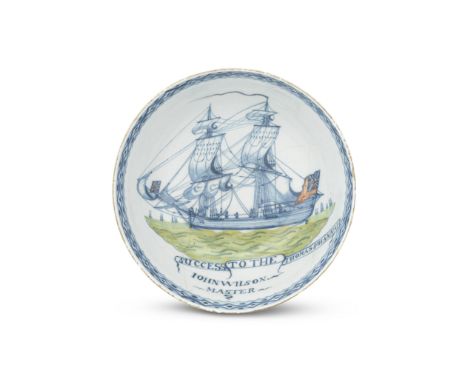 A Liverpool delftware ship bowl, circa 1770Perhaps painted by William Jackson, the interior painted in blue with a brig in fu