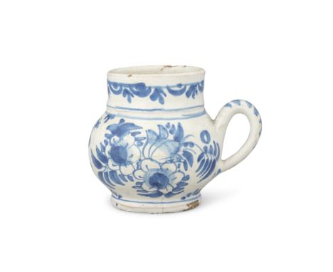 A London delftware gorge or mug, circa 1675-90Globular with a short cylindrical neck and thick looped handle, painted in blue