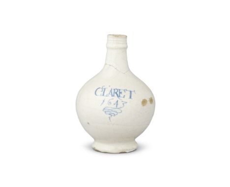A London delftware wine bottle, dated 1643Probably Southwark, the globular body raised on a small, spreading foot, the strap 