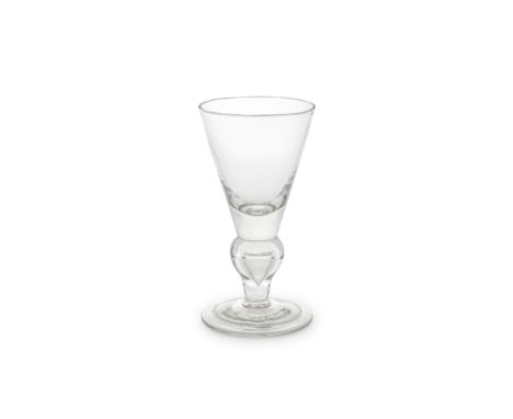 An early heavy baluster goblet, circa 1700-10The conical bowl with a solid base, set on a wide inverted baluster stem enclosi