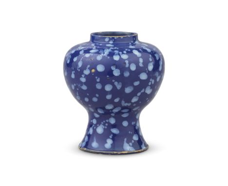 A rare London delftware 'Bleu Persan' vase, circa 1680-90Of exaggerated baluster shape on a spreading ridged foot, the rich b