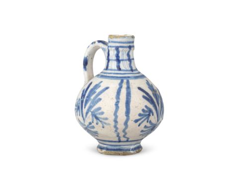 An exceptional early London delftware wine bottle, circa 1630-50Rotherhithe or Pickleherring Pottery, Southwark, of pear shap