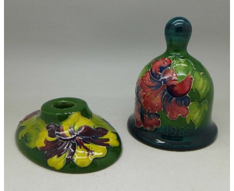 A Moorcroft bell and a Moorcroft candlestick holder