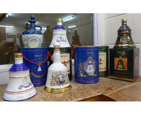 Four tins of Bell's Old Scotch Wade whisky decanters, Princess Beatrice, Princess Eugenie, Christmas 1990 and 1991, plus a bo