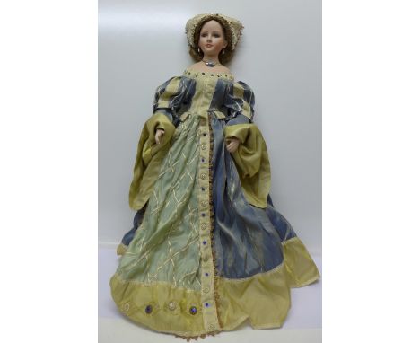 A large ceramic doll, height 70cm