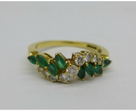 An 18ct gold, emerald and diamond ring, 4.6g, R